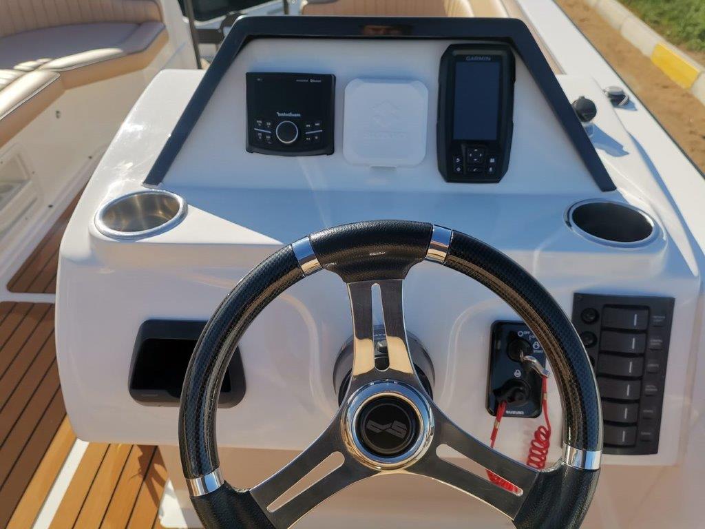 Spitfire 6250 with Nebular Black 140hp Suzuki