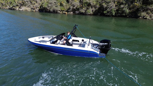 Odyssey 595 boat with Suzuki 200HP outboard on water 2