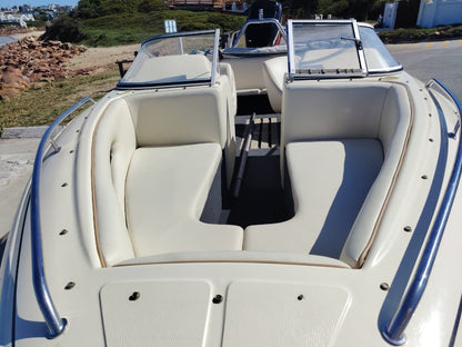 2002 Classic 170 front three-quarter angle on galvanized trailer