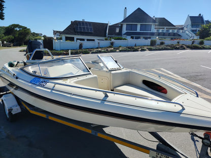 2002 Classic 170 with Mercury 150HP 2-stroke side profile on trailer