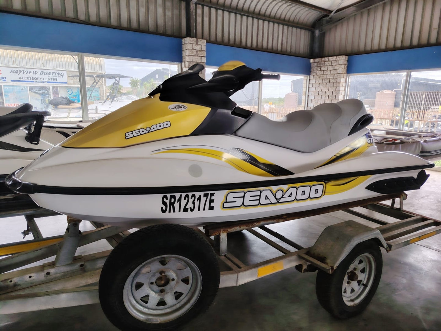 2007 Sea-Doo GTI 130 jet ski side profile on galvanized trailer