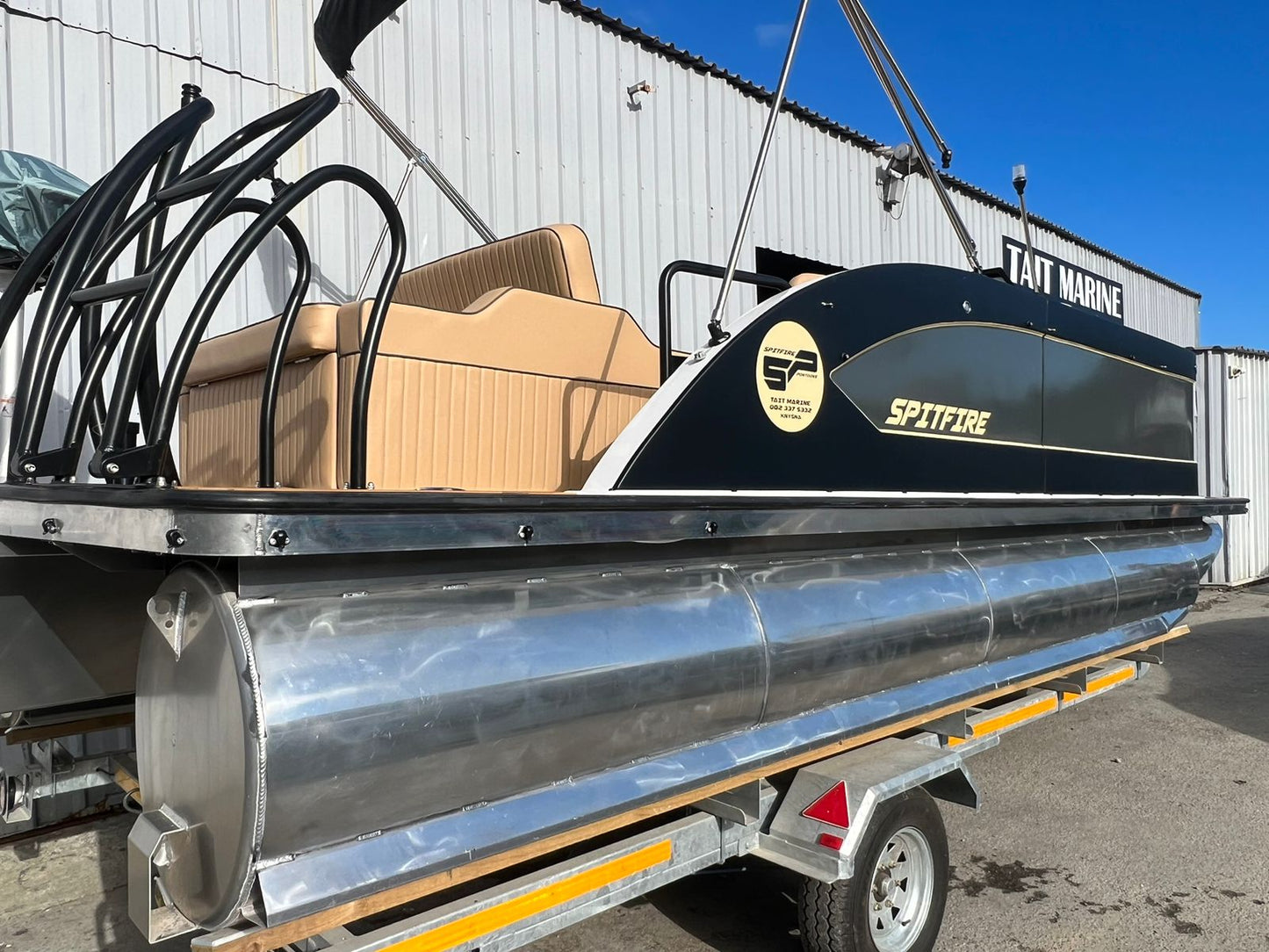 Spitfire 6250 pontoon boat diagonal view 
