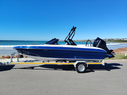 Odyssey 595 boat with Suzuki 200HP outboard on water