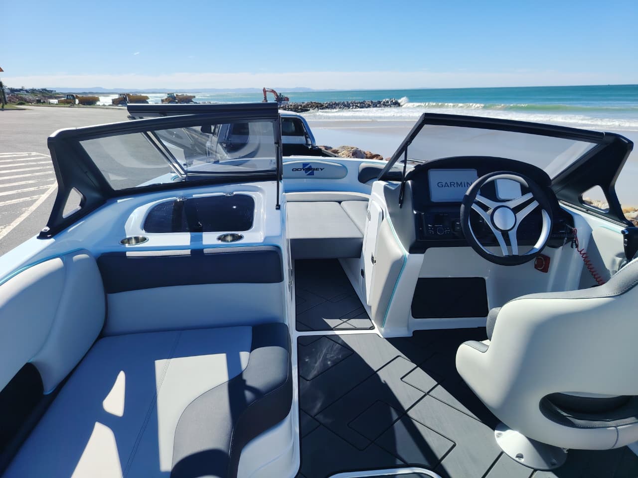 Odyssey 595 boat with Suzuki 200HP outboard  controls 3