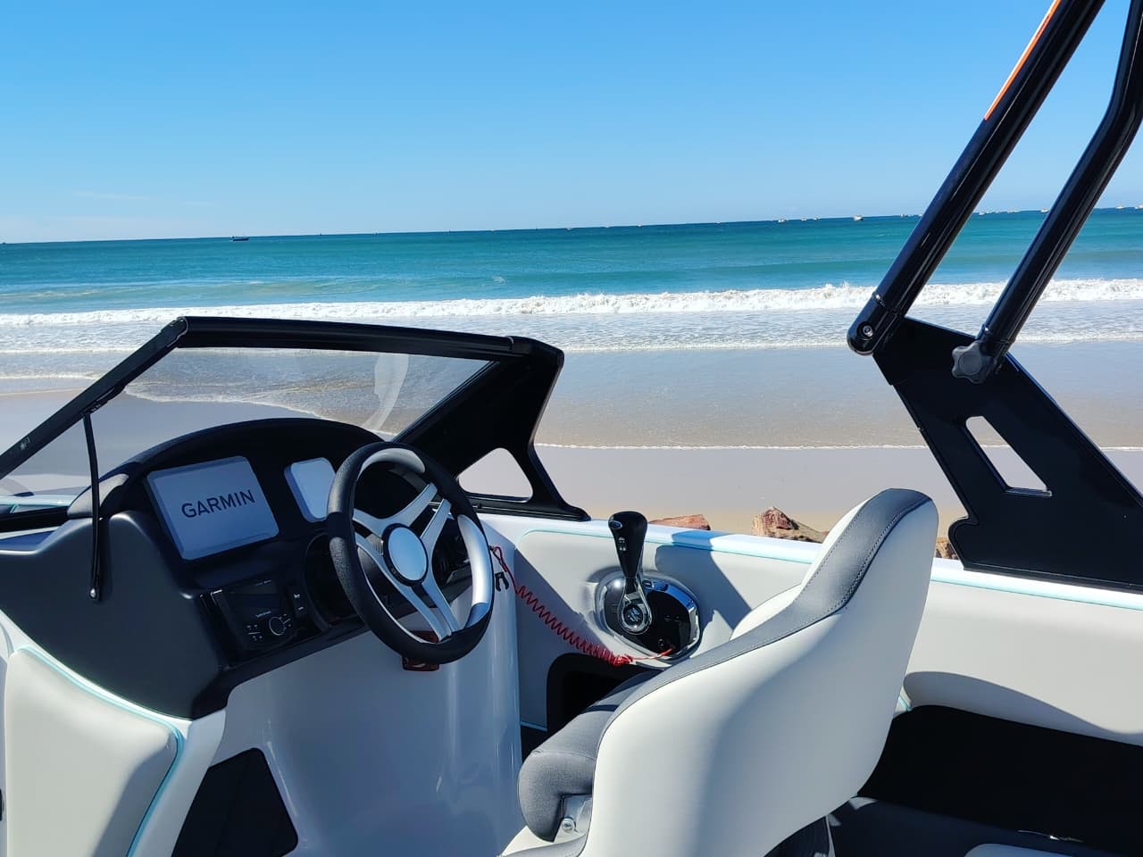 Odyssey 595 boat with Suzuki 200HP outboard  controls 2