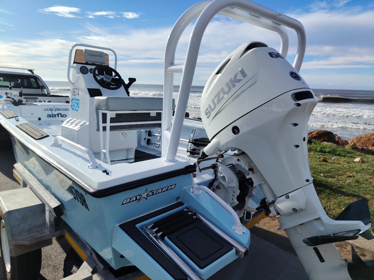 Baystar 14 fishing boat with Suzuki 60HP outboard motor back 